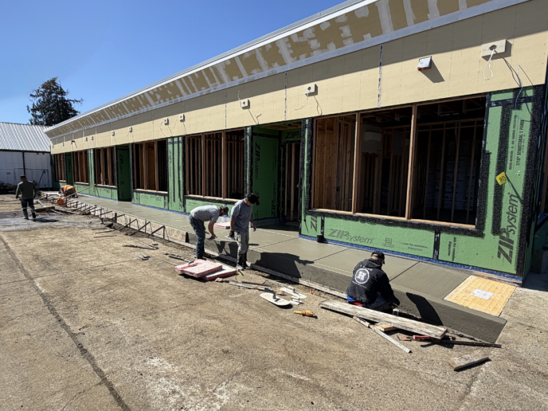 Stillwell remodel project. New sidewalks in front of the building.