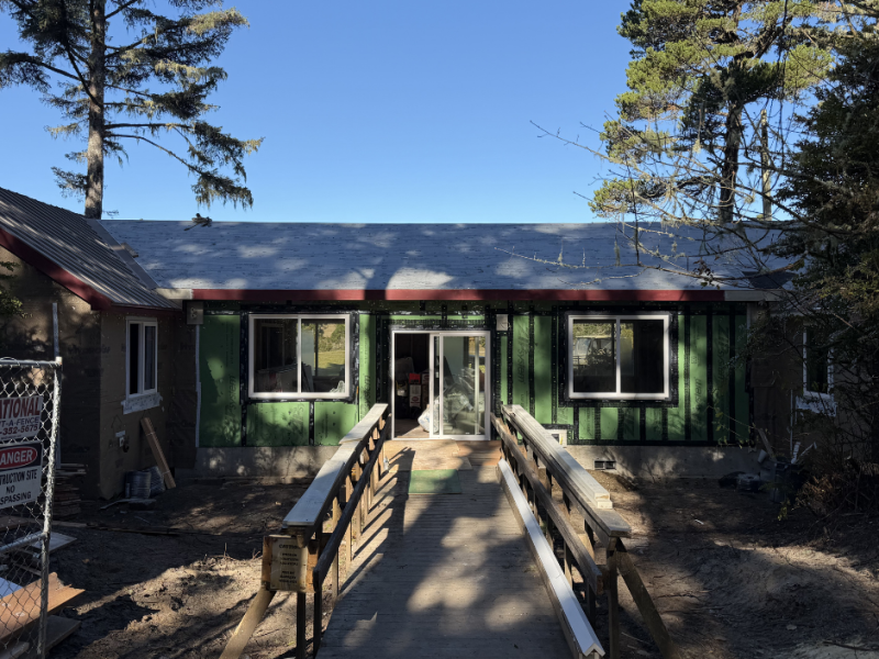Camp Magruder Lodge with siding up and roof complete
